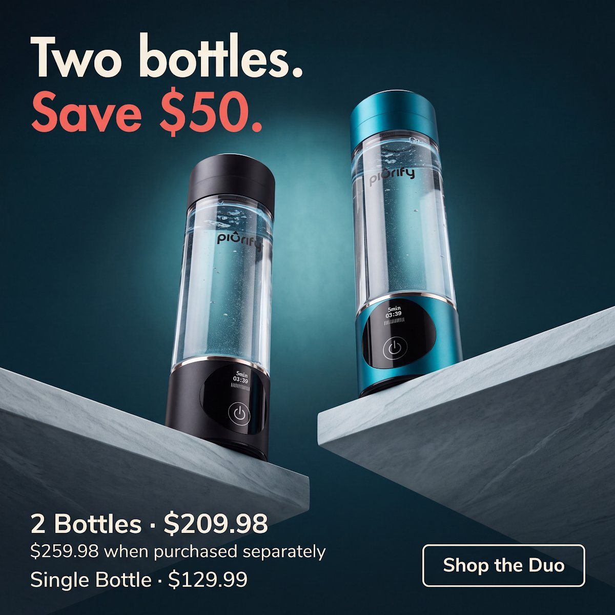 Black and teal bottles on stone plinths in a teal studio