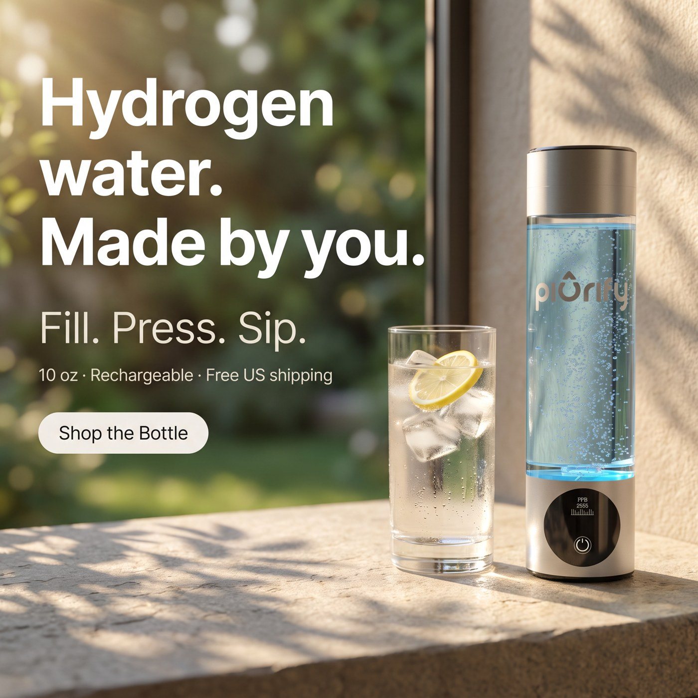 Silver bottle on a sunny ledge next to a glass of water with lemon